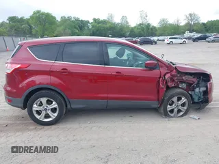 2014 Ford Escape SE z VIN 1FMCU0GX3EUC64328, wystawiony jako IAAI lot #42182502 z przebiegiem 135 496 mil mil oraz . Historia ofert i sprzedaży dostępna na DreamBid. Obrazek 13.