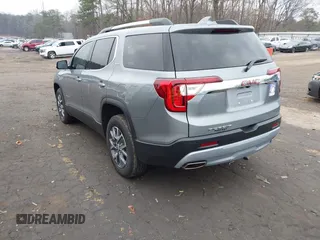 2023 GMC Acadia SLT with VIN 1GKKNML48PZ156202, listed as a IAAI auction lot 41526629 with 29,460 mi miles and . Bid and sale history available at DreamBid. Image 3.