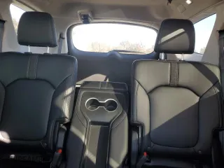 2025 Honda Pilot Touring with VIN 5FNYG2H75SB002553, listed as a Copart auction lot 76869764 with 7,426 mi miles and Salvage Title. Bid and sale history available at carsss.com. Image 10.