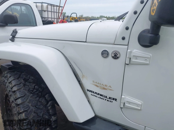 2015 Jeep Wrangler Unlimited Sahara с VIN 1C4BJWEG1FL506393, выставлен на аукционе IAAI как лот 42326900 с пробегом 100 538 миль миль и . История ставок и продаж доступна на DreamBid. Изображение 6.