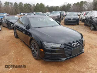 2016 Audi A7 3.0 Prestige with VIN WAU2GAFC5GN008438, listed as a IAAI auction lot 41754579 with 122,794 mi miles. Bid and sale history available at carsss.com. Image 1.