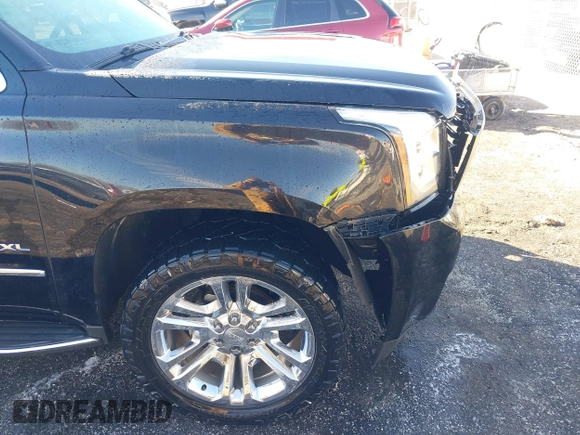 2016 GMC Yukon XL SLT with VIN 1GKS2GKC0GR443634, listed as a IAAI auction lot 41379064 with 121,744 mi miles. Bid and sale history available at carsss.com. Image 17.