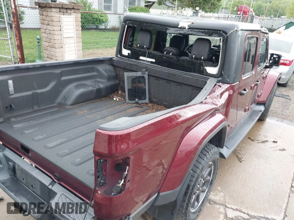 2021 Jeep Gladiator Overland with VIN 1C6HJTFGXML555622, listed as a IAAI auction lot 42237686 with 62,358 mi miles and . Bid and sale history available at DreamBid. Image 6.
