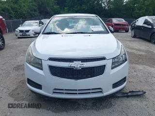 2014 Chevrolet Cruze 1LT with VIN 1G1PC5SB1E7184955, listed as a IAAI auction lot 42425326 with 144,600 mi miles and . Bid and sale history available at DreamBid. Image 12.