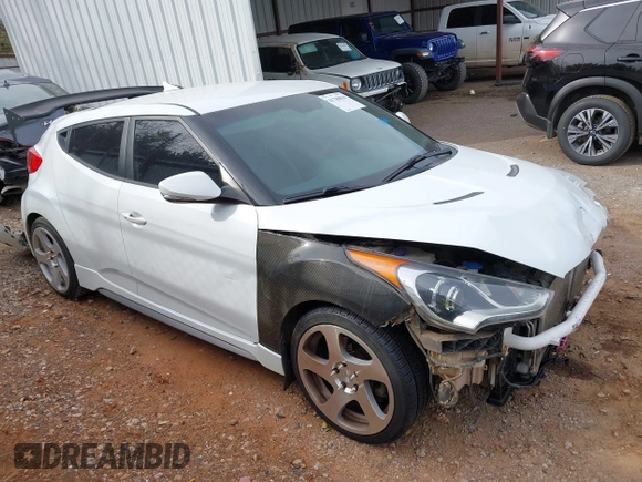 2013 Hyundai Veloster Turbo z VIN KMHTC6AE2DU128607, wystawiony jako IAAI lot #41788836 z przebiegiem 115 500 mil mil oraz . Historia ofert i sprzedaży dostępna na DreamBid. Obrazek 14.