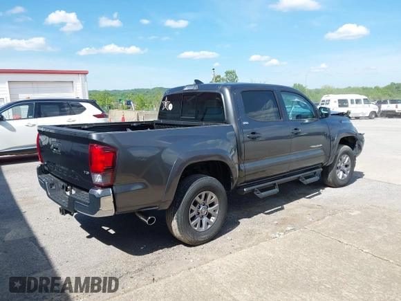 2018 Toyota Tacoma SR5 with VIN 3TMAZ5CN9JM070187, listed as a IAAI auction lot 41816520 with 43,068 mi miles and . Bid and sale history available at DreamBid. Image 4.