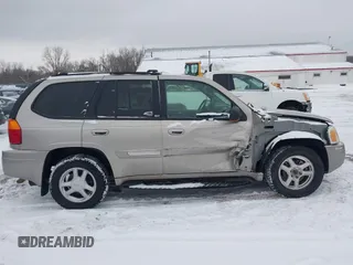 2002 GMC Envoy SLT with VIN 1GKDT13S022333743, listed as a IAAI auction lot 41562458 with 193,087 mi miles. Bid and sale history available at carsss.com. Image 13.