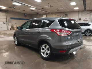 2014 Ford Escape SE with VIN 1FMCU9G9XEUD69423, listed as a IAAI auction lot 41908718 with 65,149 mi miles. Bid and sale history available at carsss.com. Image 3.