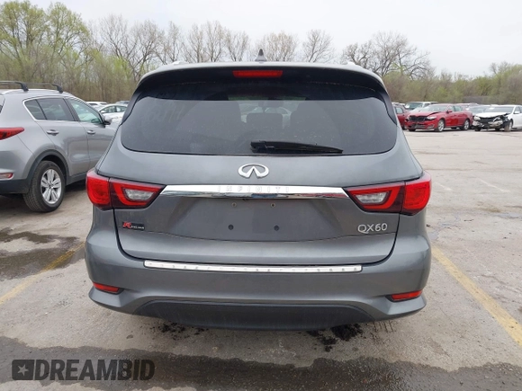 2019 Infiniti QX60 Pure z VIN 5N1DL0MN0KC516547, wystawiony jako IAAI lot #41947705 z przebiegiem 83 454 mil mil oraz . Historia ofert i sprzedaży dostępna na DreamBid. Obrazek 16.