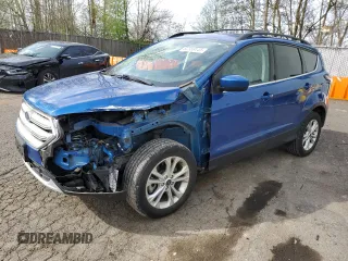 2018 Ford Escape SE z VIN 1FMCU9GD4JUC60647, wystawiony jako Copart lot #55429455 z przebiegiem 22 826 mil mil oraz Szkody całkowita. Historia ofert i sprzedaży dostępna na DreamBid. Obrazek 1.
