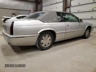 2000 Cadillac Eldorado Touring ETC z VIN 1G6ET1294YU180525, wystawiony jako Copart lot #89253455 z przebiegiem 102 230 mil mil oraz Nie do naprawy • Non repairable. Historia ofert i sprzedaży dostępna na DreamBid. Obrazek 3.