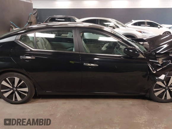 2021 Nissan Altima SV with VIN 1N4BL4DV6MN411107, listed as a IAAI auction lot 42103161 with 22,133 mi miles and . Bid and sale history available at DreamBid. Image 14.