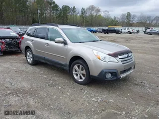 2014 Subaru Outback 3.6R Limited with VIN 4S4BRDNC3E2233693, listed as a IAAI auction lot 41875185 with 176,493 mi miles. Bid and sale history available at carsss.com. Image 1.