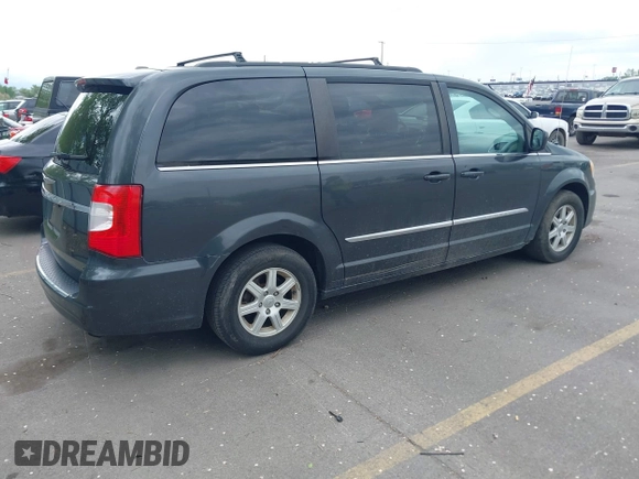 2012 Chrysler Town & Country Touring with VIN 2C4RC1BG1CR312532, listed as a IAAI auction lot 42194864 with 197,609 mi miles and . Bid and sale history available at DreamBid. Image 4.