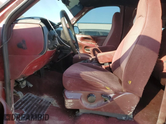 1997 Ford F-150 XL with VIN 1FTDX0721VKC14947, listed as a Copart auction lot 74887414 with 157,811 mi miles and Salvage title. Bid and sale history available at DreamBid. Image 7.