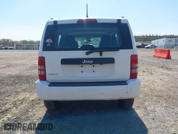 2012 Jeep Liberty Sport z VIN 1C4PJMAK7CW209305, wystawiony jako IAAI lot #42105378 z przebiegiem 136 617 mil mil oraz . Historia ofert i sprzedaży dostępna na DreamBid. Obrazek 16.