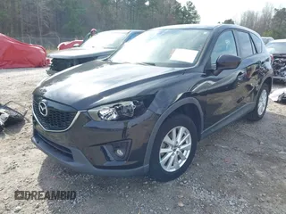 2014 Mazda CX-5 Touring with VIN JM3KE2CY9E0333951, listed as a IAAI auction lot 41825345 with 124,684 mi miles. Bid and sale history available at carsss.com. Image 18.