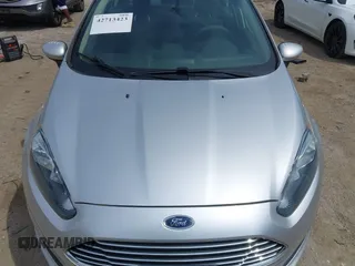 2019 Ford Fiesta S with VIN 3FADP4AJ6KM117812, listed as a IAAI auction lot 42713423 with 122,115 mi miles and . Bid and sale history available at DreamBid. Image 6.