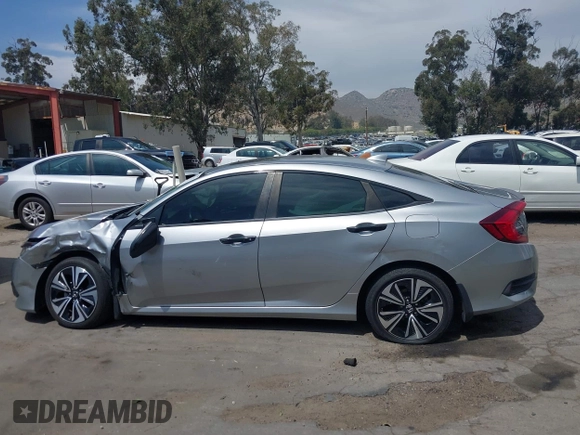 2018 Honda Civic EX-L z VIN JHMFC1F79JX037843, wystawiony jako IAAI lot #42121623 z przebiegiem 49 759 mil mil oraz . Historia ofert i sprzedaży dostępna na DreamBid. Obrazek 15.