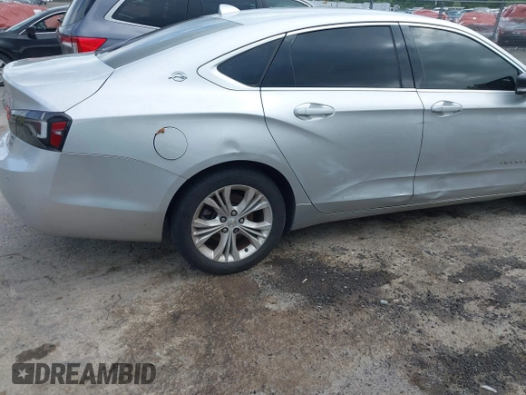 2014 Chevrolet Impala LT with VIN 2G1115SL4E9279660, listed as a IAAI auction lot 42675495 with 159,215 mi miles and . Bid and sale history available at DreamBid. Image 19.