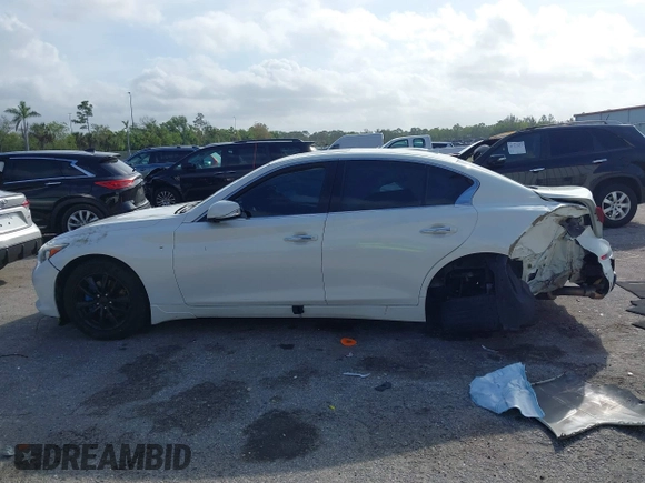 2015 Infiniti Q50 Premium z VIN JN1BV7AR5FM415612, wystawiony jako IAAI lot #41726943 z przebiegiem 120 534 mil mil oraz . Historia ofert i sprzedaży dostępna na DreamBid. Obrazek 14.