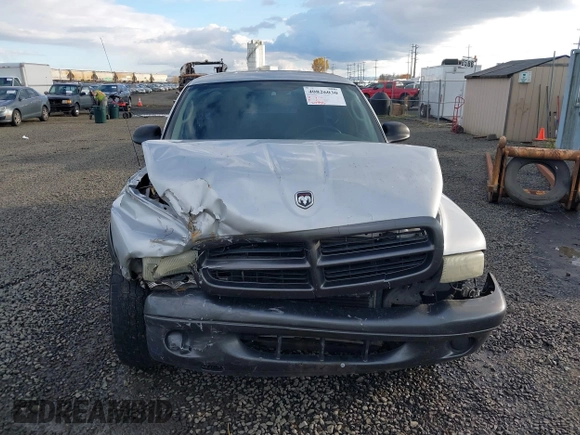 2002 Dodge Dakota with VIN 1B7GL12X42S698285, listed as a IAAI auction lot 40826030 with 211,936 mi miles and . Bid and sale history available at carsss.com. Image 13.