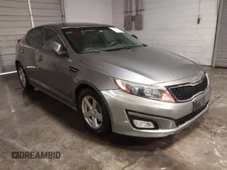 2015 Kia Optima LX z VIN 5XXGM4A70FG426848, wystawiony jako IAAI lot #41285010 z przebiegiem 214 977 mil mil oraz . Historia ofert i sprzedaży dostępna na DreamBid. Obrazek 1.