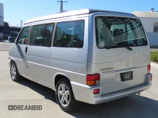 2003 Volkswagen EuroVan MV with VIN WV2NB47003H003033, listed as a Copart auction lot 47059195 with 164,173 mi miles and Clean Title. Bid and sale history available at DreamBid. Image 4.