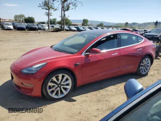 2018 Tesla Model 3 Long Range Battery z VIN 5YJ3E1EA4JF061733, wystawiony jako Copart lot #54885335 z przebiegiem 84 700 mil mil oraz Szkoda całkowita • Salvage title. Historia ofert i sprzedaży dostępna na DreamBid. Obrazek 1.