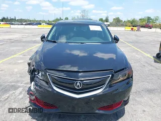 2013 Acura ILX Technology z VIN 19VDE1F72DE014291, wystawiony jako IAAI lot #42221550 z przebiegiem 134 825 mil mil oraz . Historia ofert i sprzedaży dostępna na DreamBid. Obrazek 13.