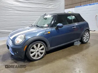 2009 MINI Convertible z VIN WMWMR335X9TJ93685, wystawiony jako Copart lot #50899755 z przebiegiem 123 609 mil mil oraz Szkoda całkowita • Salvage title. Historia ofert i sprzedaży dostępna na DreamBid. Obrazek 1.