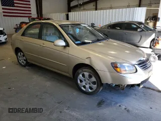 2009 Kia Spectra EX with VIN KNAFE222395665848, listed as a Copart auction lot 51017925 with 30,186 mi miles and Salvage Title. Bid and sale history available at DreamBid. Image 4.