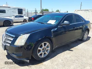 2009 Cadillac CTS RWD z VIN 1G6DU57V390157350, wystawiony jako IAAI lot #42306411 z przebiegiem 125 250 mil mil oraz . Historia ofert i sprzedaży dostępna na DreamBid. Obrazek 2.