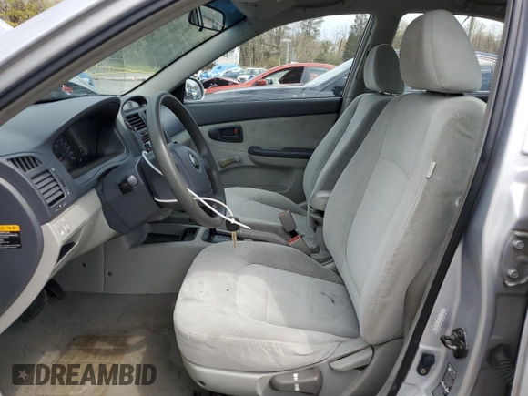 2004 Kia Spectra LX with VIN KNAFE121245031019, listed as a Copart auction lot 52960135 with 183,016 mi miles and Salvage Title. Bid and sale history available at carsss.com. Image 7.