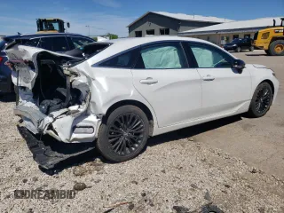 2019 Toyota Avalon Limited Hybrid z VIN 4T1B21FB6KU010122, wystawiony jako Copart lot #60954194 z przebiegiem 43 472 mil mil oraz Nie do naprawy • Non repairable. Historia ofert i sprzedaży dostępna na DreamBid. Obrazek 3.