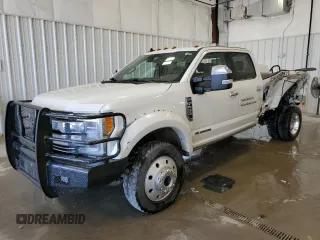 2019 Ford Super Duty F-450 DRW XL with VIN 1FT8W4DT0KEG00875, listed as a Copart auction lot 69857694 with 128,581 mi miles and Salvage Title. Bid and sale history available at carsss.com. Image 1.