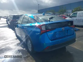 2020 Toyota Prius L Eco z VIN JTDKARFU1L3111938, wystawiony jako IAAI lot #41578853 z przebiegiem 117 641 mil mil oraz . Historia ofert i sprzedaży dostępna na DreamBid. Obrazek 3.