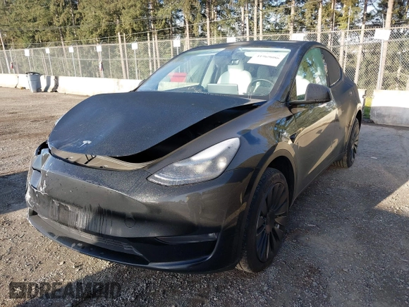 2023 Tesla Model Y Long Range z VIN 7SAYGDEE9PF637042, wystawiony jako IAAI lot #41969086 z przebiegiem 25 524 mil mil oraz . Historia ofert i sprzedaży dostępna na DreamBid. Obrazek 19.