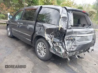 2014 Chrysler Town & Country Touring L with VIN 2C4RC1CG6ER195502, listed as a IAAI auction lot 42009629 with 126,157 mi miles and . Bid and sale history available at DreamBid. Image 3.