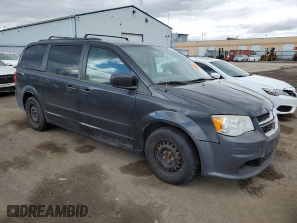 2012 Dodge Grand Caravan SE with VIN 2C4RDGBG5CR397651, listed as a Copart auction lot 52878905 with 248,103 mi miles and Clean Title. Bid and sale history available at DreamBid. Image 4.