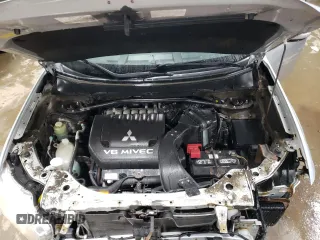 2010 Mitsubishi Outlander XLS z VIN JA4JT4AX9AZ002688, wystawiony jako Copart lot #51173605 z przebiegiem 162 147 mil mil oraz Szkoda całkowita • Salvage title. Historia ofert i sprzedaży dostępna na DreamBid. Obrazek 11.
