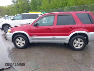 2005 Ford Escape Hybrid with VIN 1FMCU96H95KC81872, listed as a IAAI auction lot 42292225 with 165,259 mi miles and . Bid and sale history available at DreamBid. Image 14.