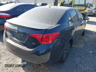 2019 Toyota Corolla L with VIN 2T1BURHE3KC137878, listed as a IAAI auction lot 41861012 with 145,668 mi miles and . Bid and sale history available at DreamBid. Image 4.