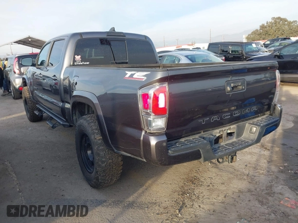 2021 Toyota Tacoma 4WD SR5 with VIN 3TMDZ5BN2MM108586, listed as a IAAI auction lot 41604953 with 65,422 mi miles. Bid and sale history available at carsss.com. Image 3.