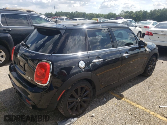 2016 MINI Hardtop 4 Door S with VIN WMWXU3C58G2B67264, listed as a Copart auction lot 61454215 with 66,550 mi miles and Salvage title. Bid and sale history available at DreamBid. Image 3.