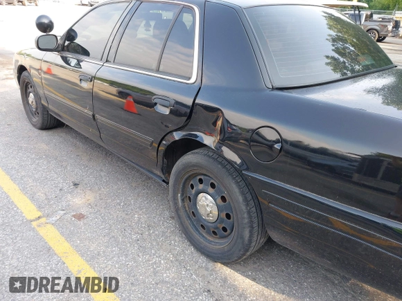 2011 Ford Police Interceptor with VIN 2FABP7BV3BX175570, listed as a IAAI auction lot 42693137 with Not provided miles and . Bid and sale history available at DreamBid. Image 12.