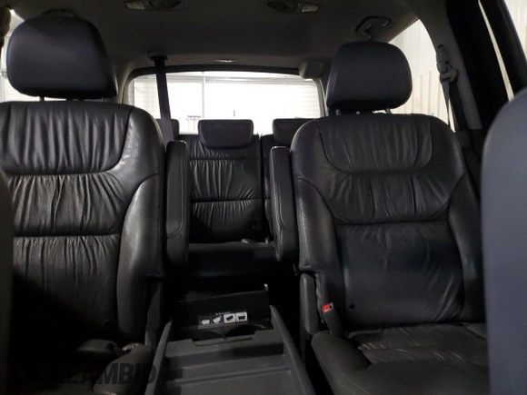 2007 Honda Odyssey Touring с VIN 5FNRL38827B074039, выставлен на аукционе Copart как лот 57208225 с пробегом 142 762 миль миль и Списание • Salvage title. История ставок и продаж доступна на DreamBid. Изображение 10.