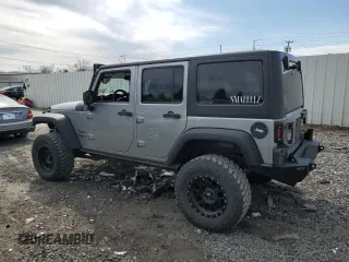 2014 Jeep Wrangler Unlimited Sport with VIN 1C4BJWDG3EL108151, listed as a Copart auction lot 49862315 with 104,417 mi miles and Salvage Title. Bid and sale history available at carsss.com. Image 2.