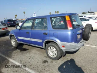 2000 Honda CR-V LX with VIN JHLRD1743YC025806, listed as a Copart auction lot 89333045 with 201,353 mi miles and Salvage Title. Bid and sale history available at carsss.com. Image 2.