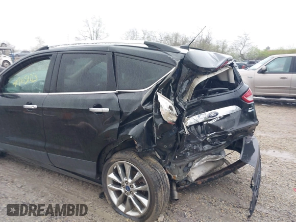 2014 Ford Escape SE z VIN 1FMCU9G94EUD64427, wystawiony jako IAAI lot #41965103 z przebiegiem 66 429 mil mil oraz . Historia ofert i sprzedaży dostępna na DreamBid. Obrazek 13.